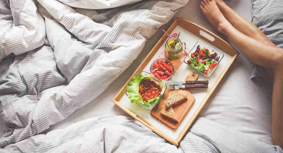Romantic breakfast in bed as a surprise 