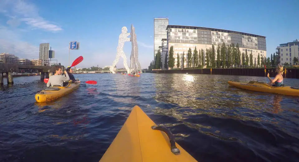 Kayaking in Berlin next to the famous Molecule Man