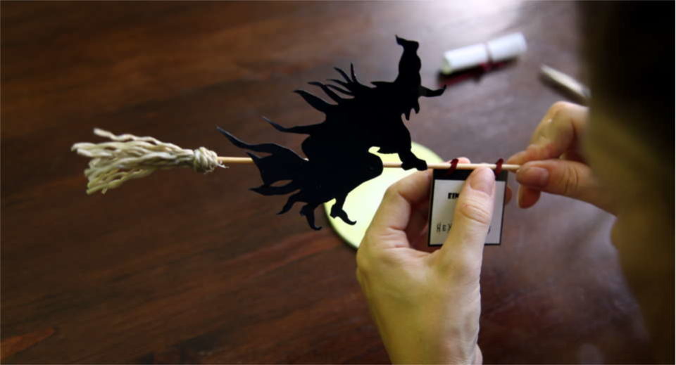 The witch party invitation card is glued together at the end.