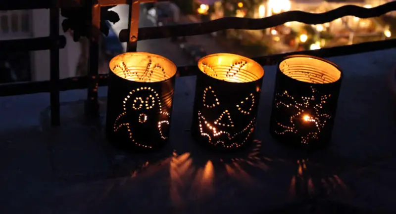 Halloween lanterns made from tin cans 