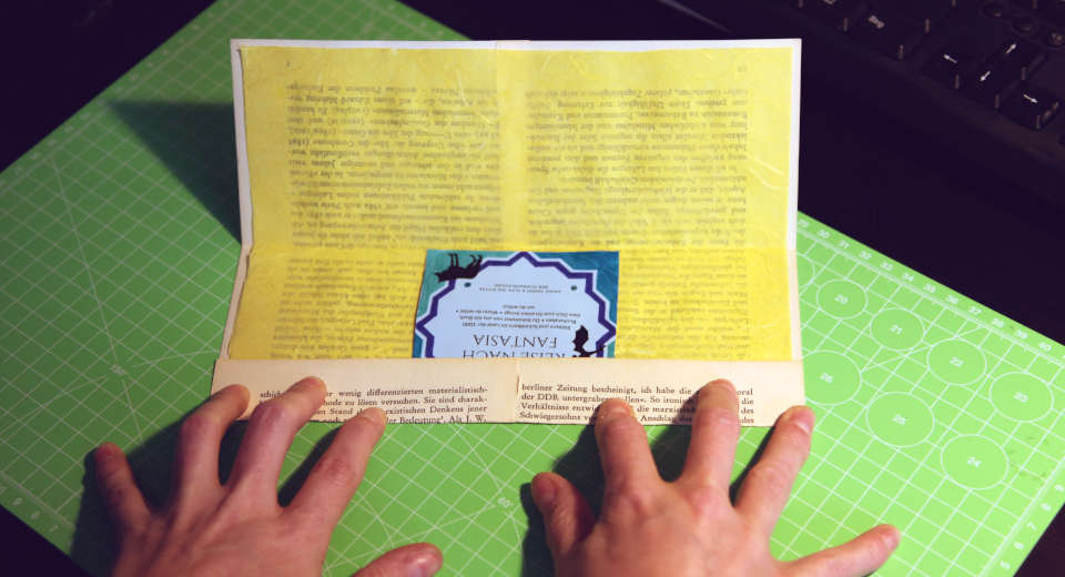 Bookgift idea as a voucher in homemade envelope
