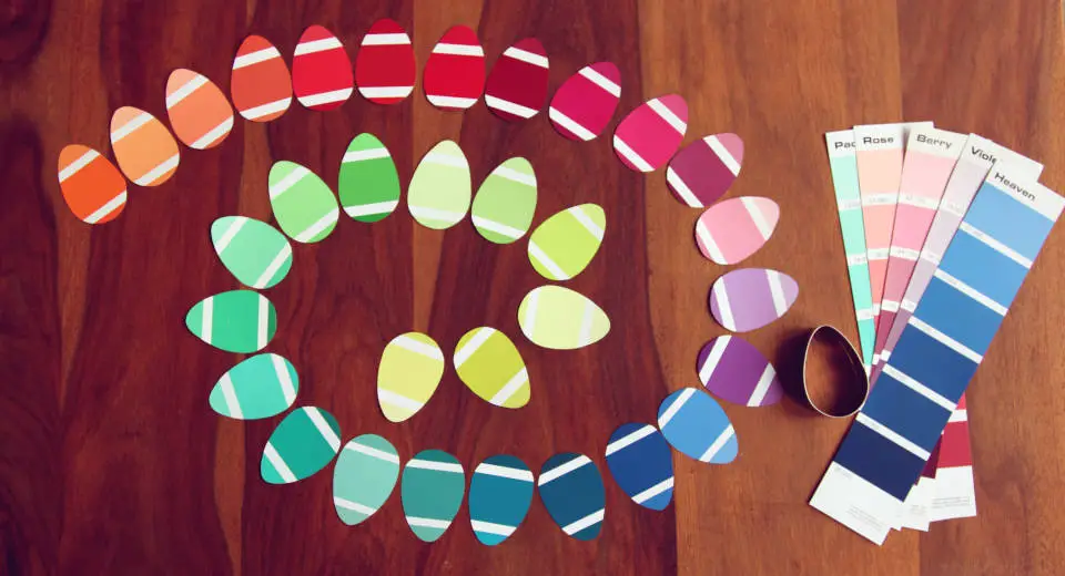 Crafting Easter eggs in rainbow colours for an Easter egg garland